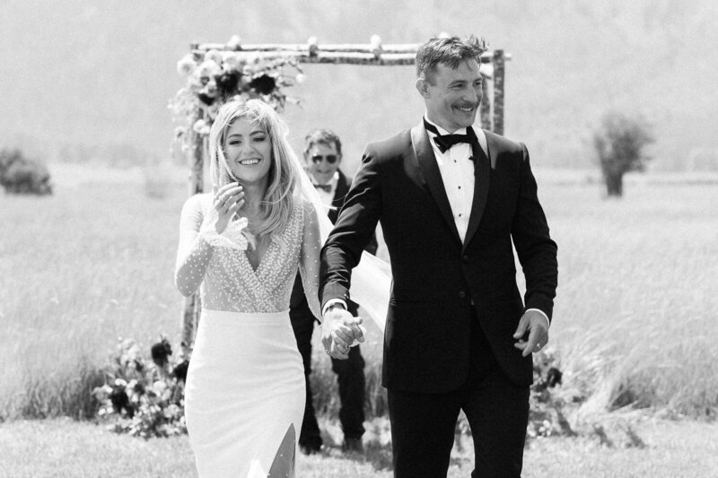 Bride and Groom walking down aisle after Ceremony