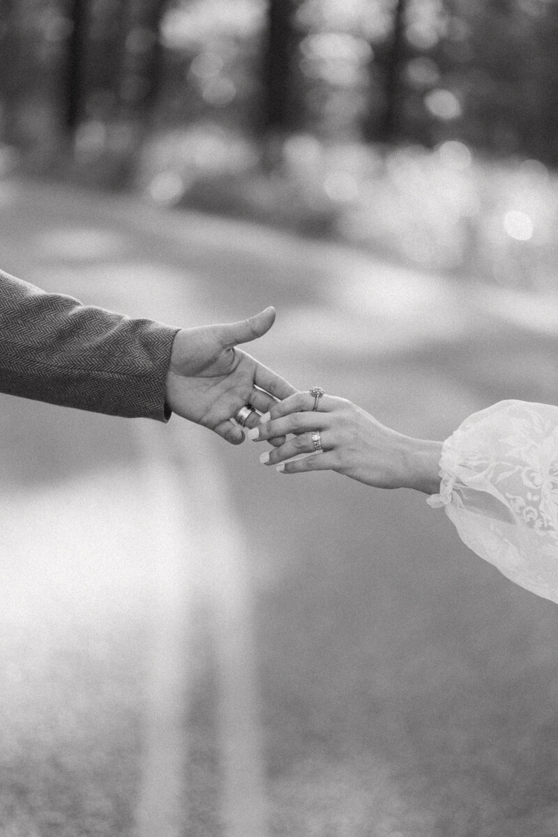 newlyweds holding hands in the street