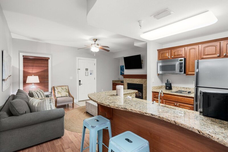 open floor plan with bar stools