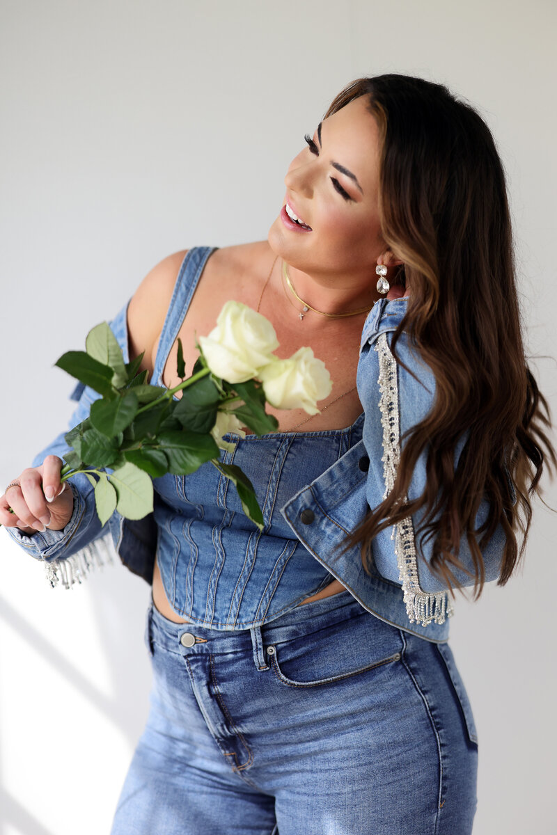 Dr. Morgan holding bouquet of white roses