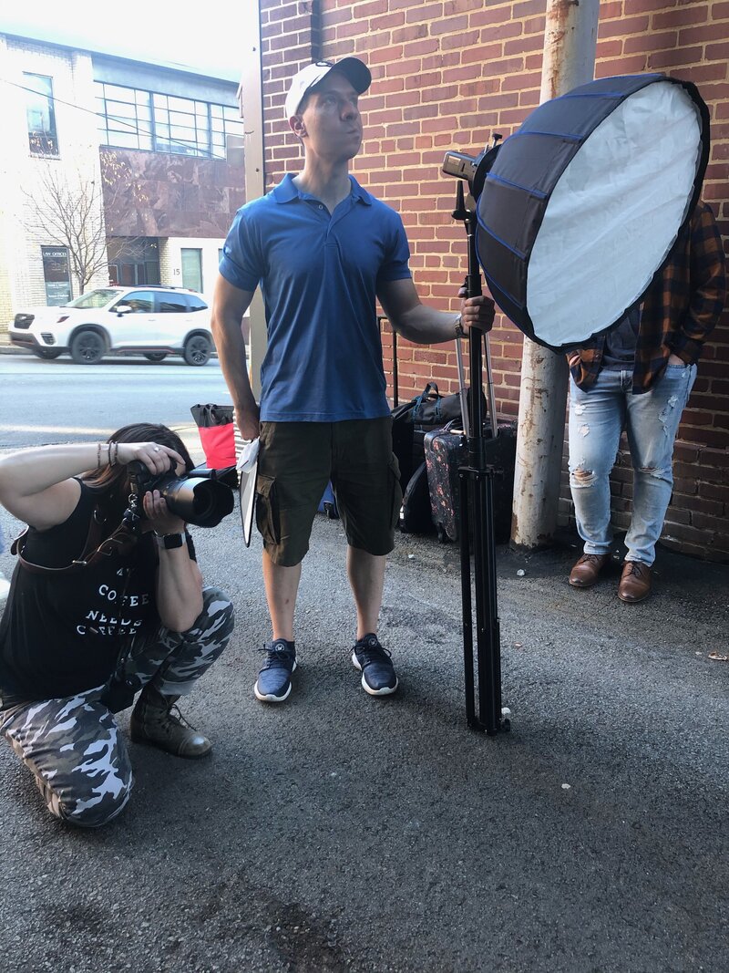 Behind-the-scenes photo shoot in urban alley