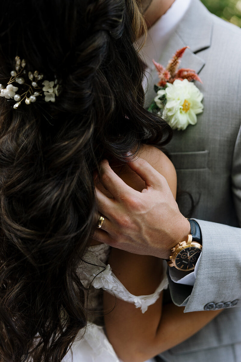 bride and groom embrace on wedding day in lancaster pa