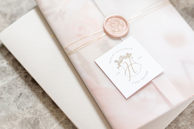 Luxury branded stationery for Hayley Elizabeth, styled on a marble surface