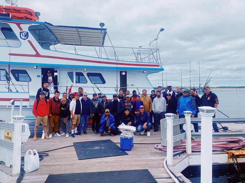 D.Muzzioli Associates team event, fishing trip Dante Muzzioli and employees