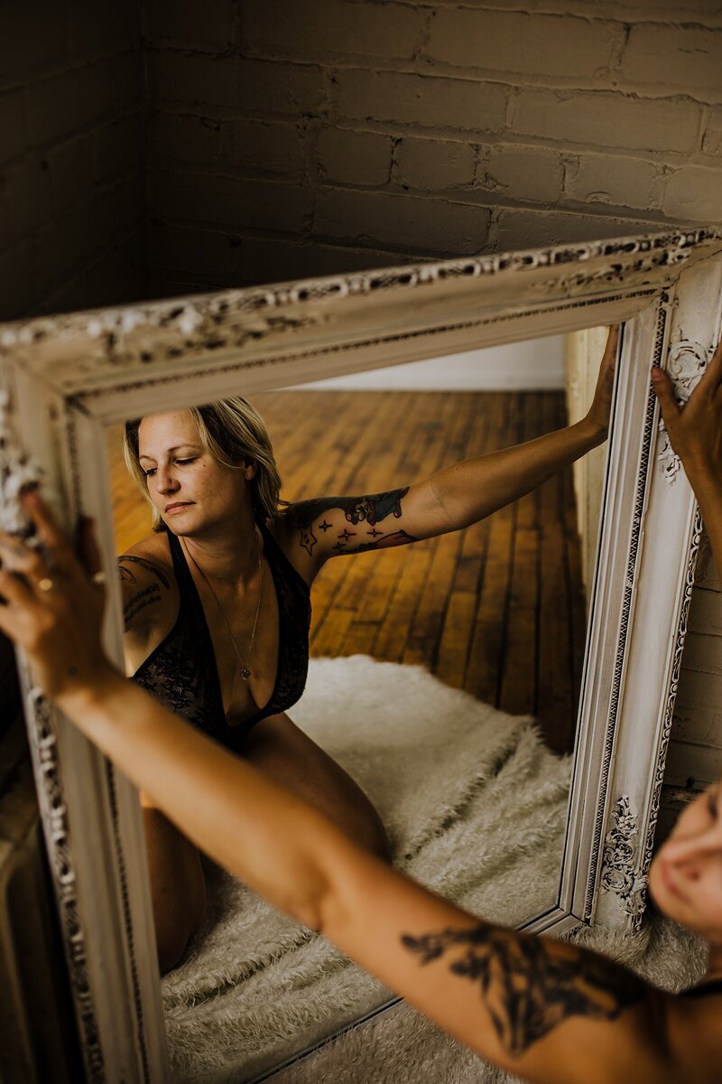 girl in front of mirror in lingerie