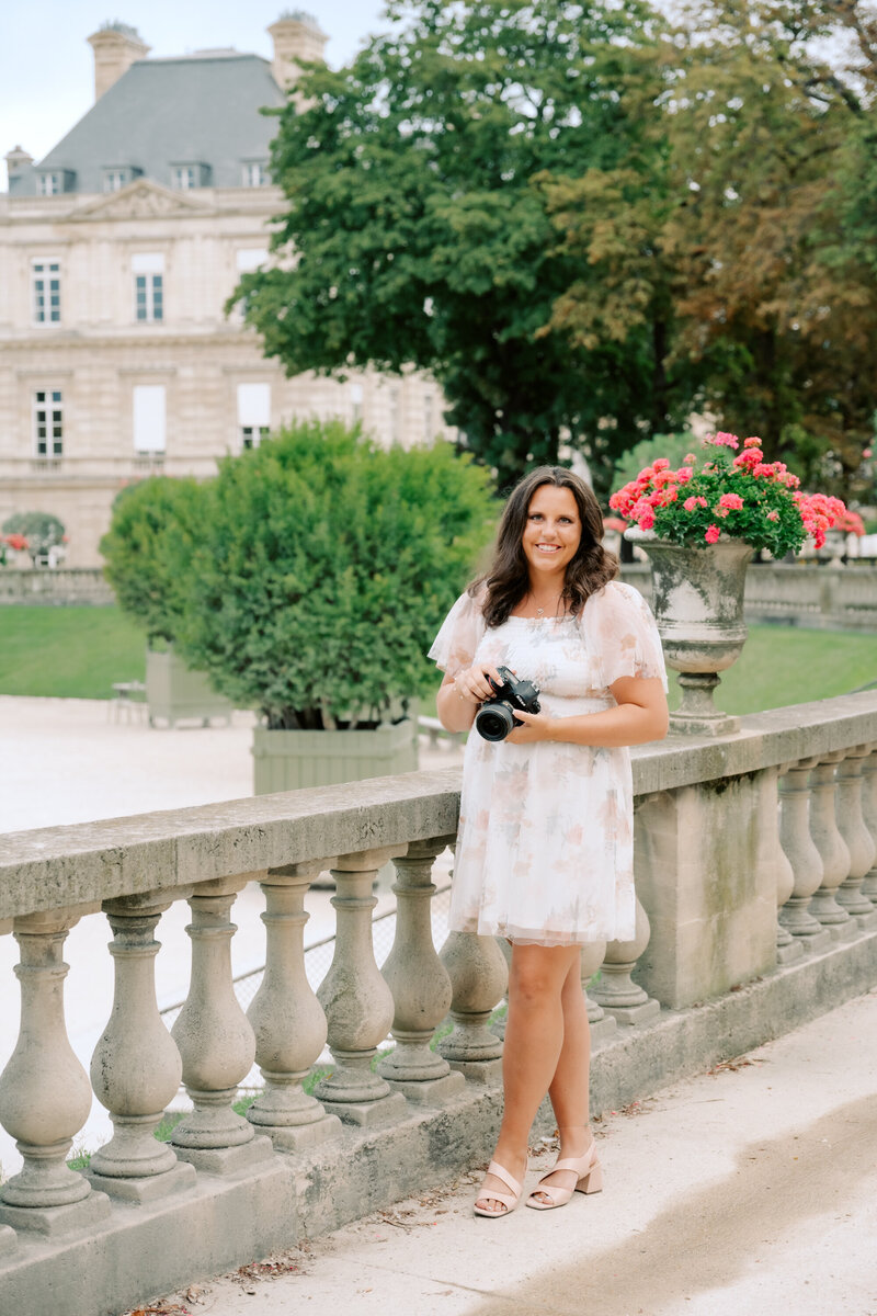 couple facing each other smiling in front of chateau