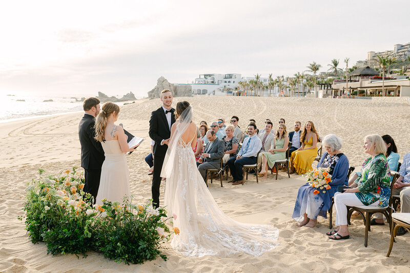 Intimate Beach Wedding Ceremony in Cabo, Mexico. Photographed by Sarah Woods Photography