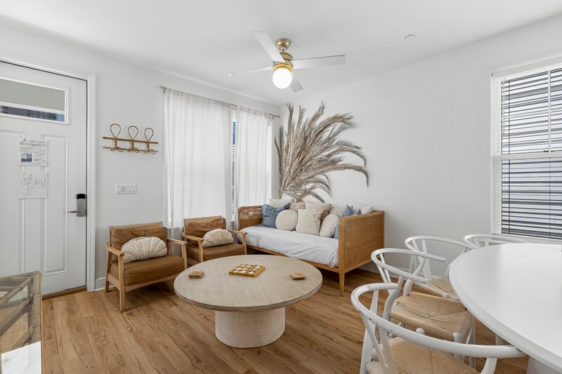 Bright and airy coastal-themed living room at Beach Cabana in Panama City Beach, ideal for PCB vacation rentals and 30A beach getaways