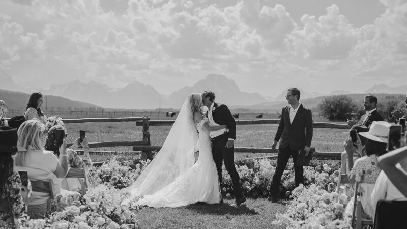 A couple on the shore of Sawtooth Lake in Idaho after their elopement