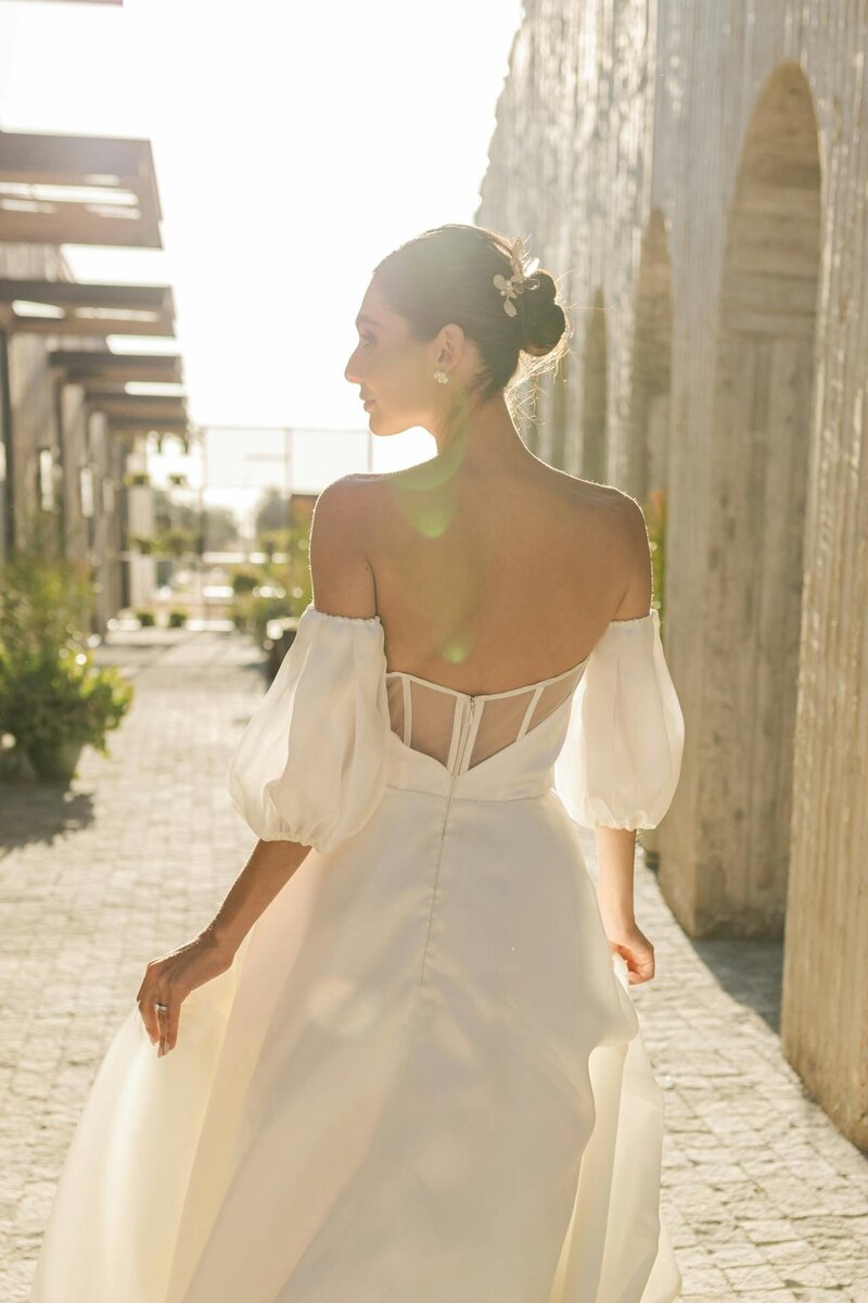elegant bride walking after her wedding destination ceremony in a luxury villa in corfu