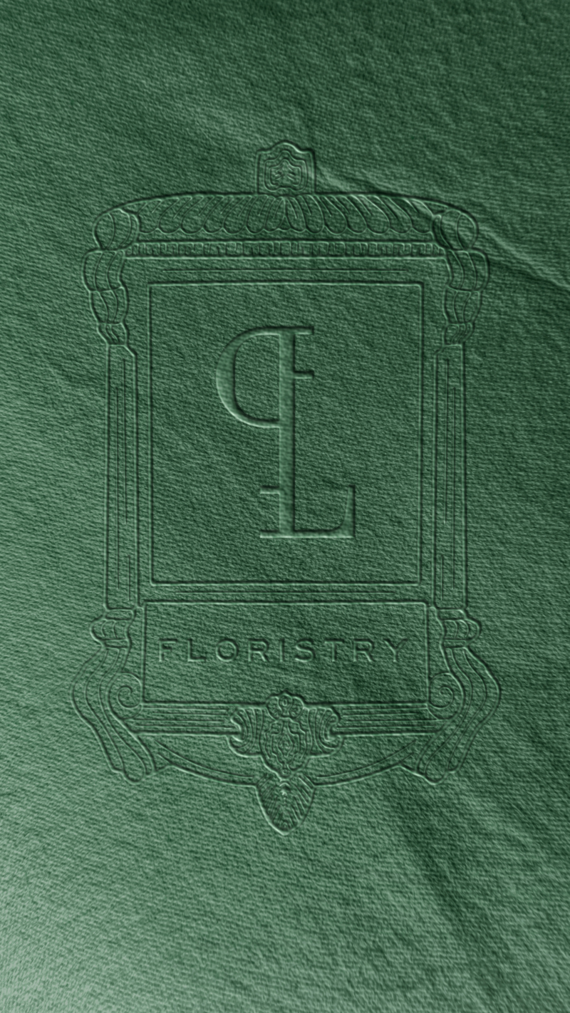 green embossed paper with poppy love logo