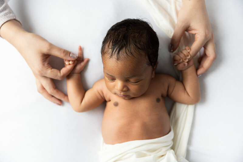 Newborn baby on the In-home pop-up studio.