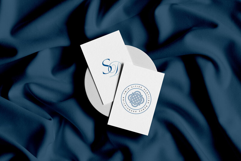 Business cards on blue backdrop showing brand design for photographers Palme Design Co
