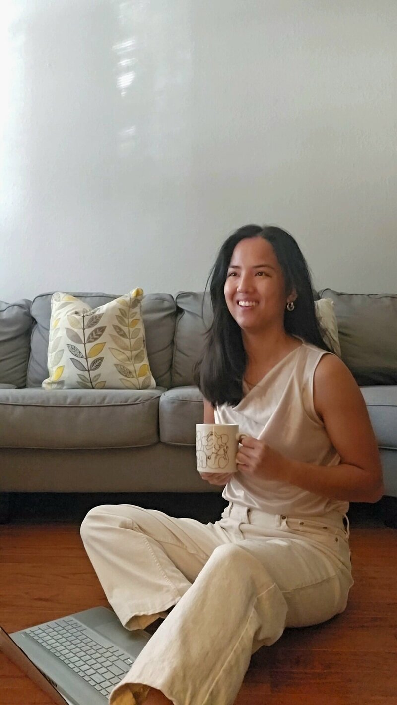 digital marketing agency jacksonville fl, emily smiling iwth coffee mu