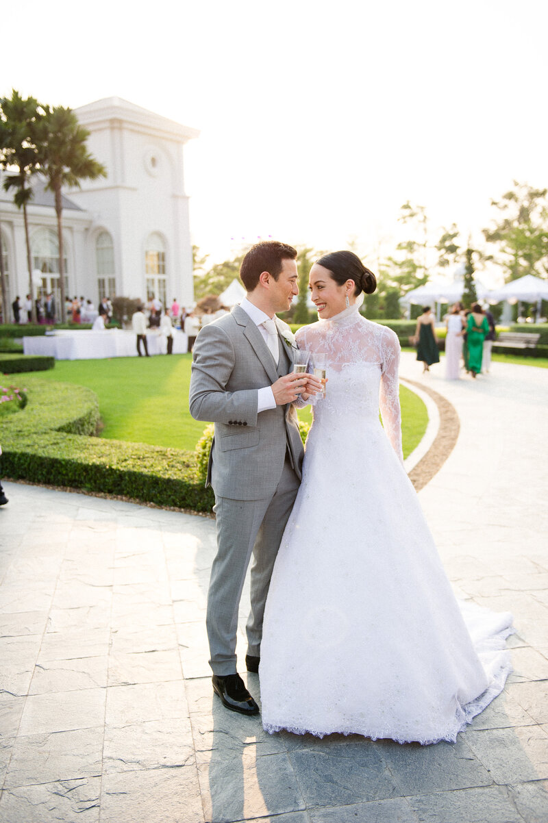 Bride and groom walk up memorial steps at their DC wedding