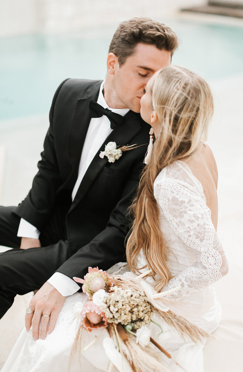Tulum-bride-and-groom-kissing