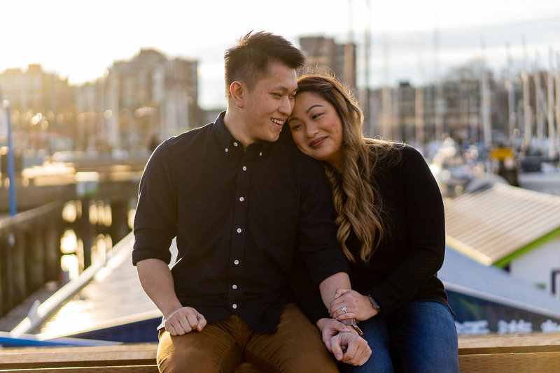 Granville Island engagement session with sunset in the backfground