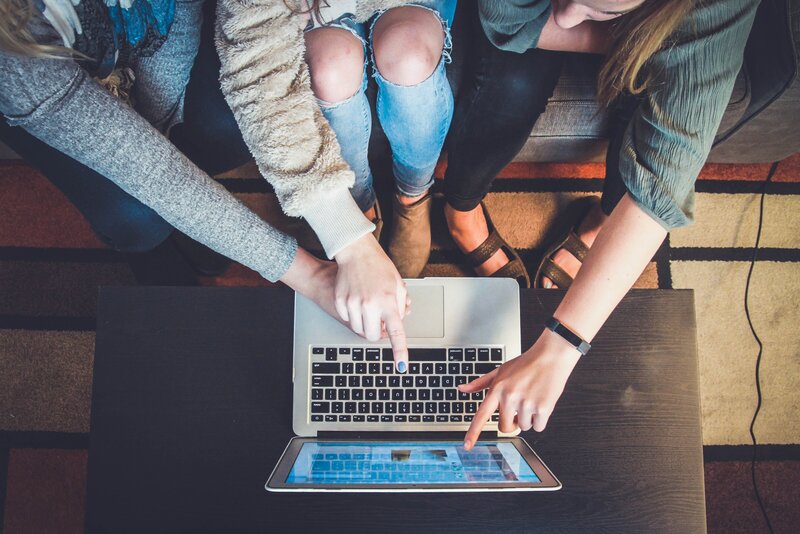 group of women learning about empowered birth online