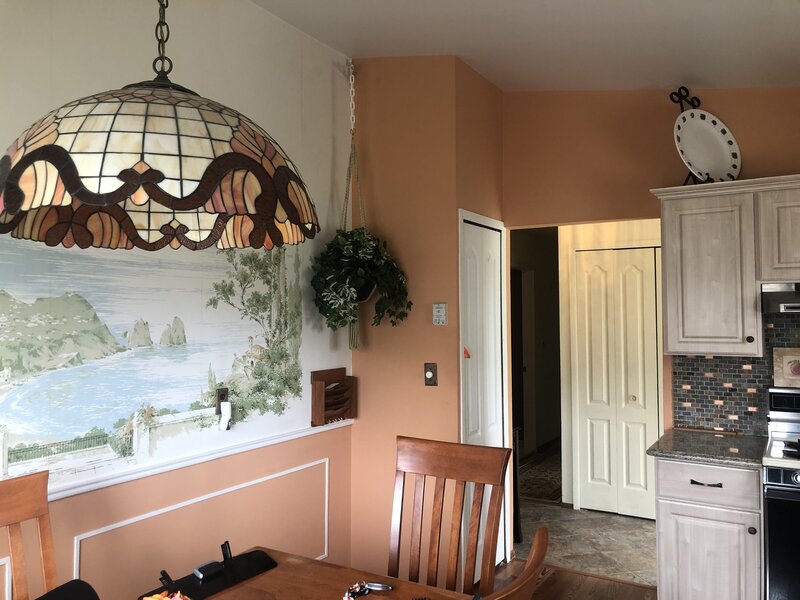 Photo of a kitchen before it was remodeled and staged.