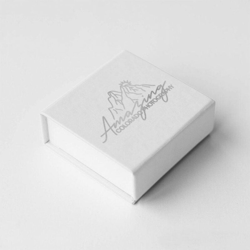 Engraved USB keepsake included in Colorado micro-wedding photography package delivery