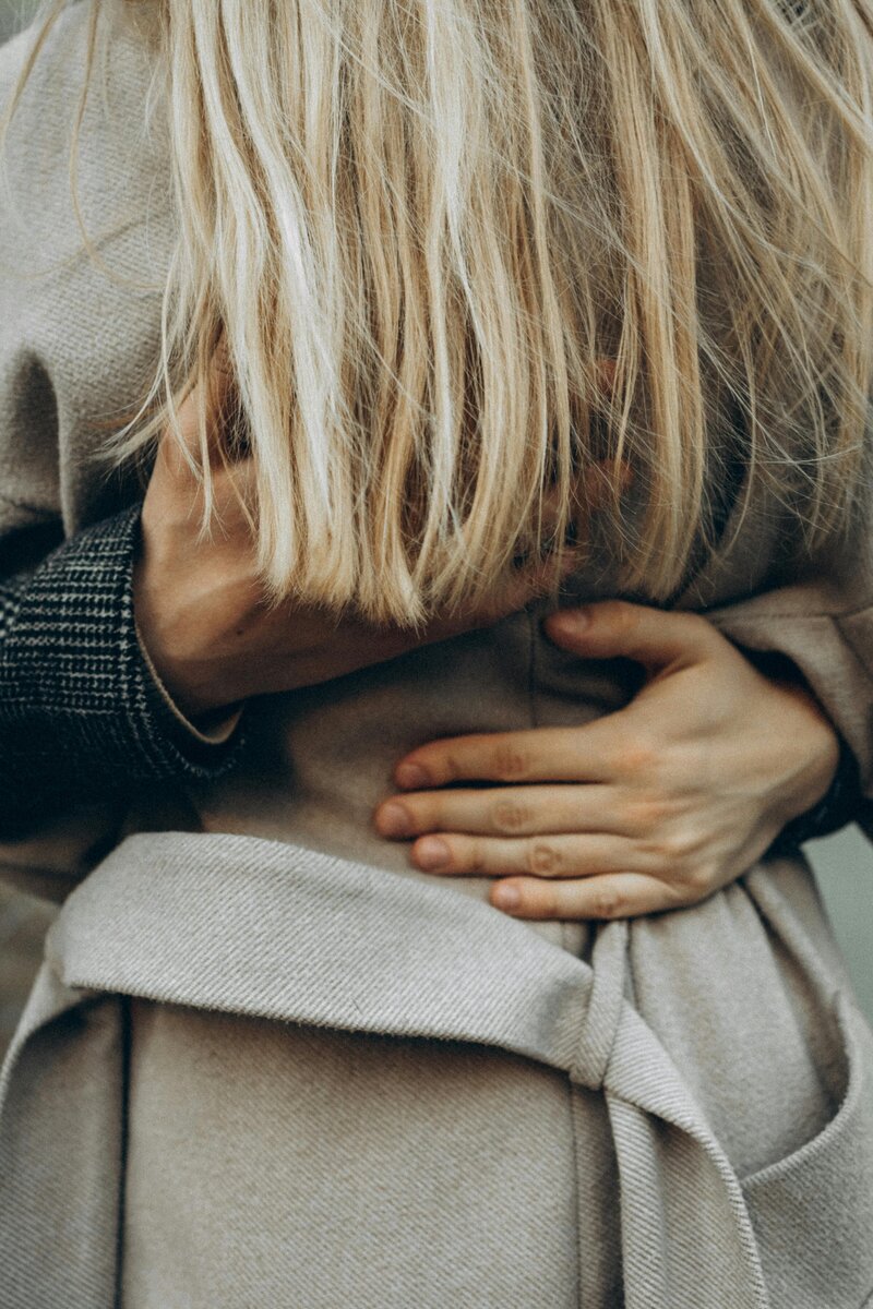 Mand and woman holding each other in an embrace