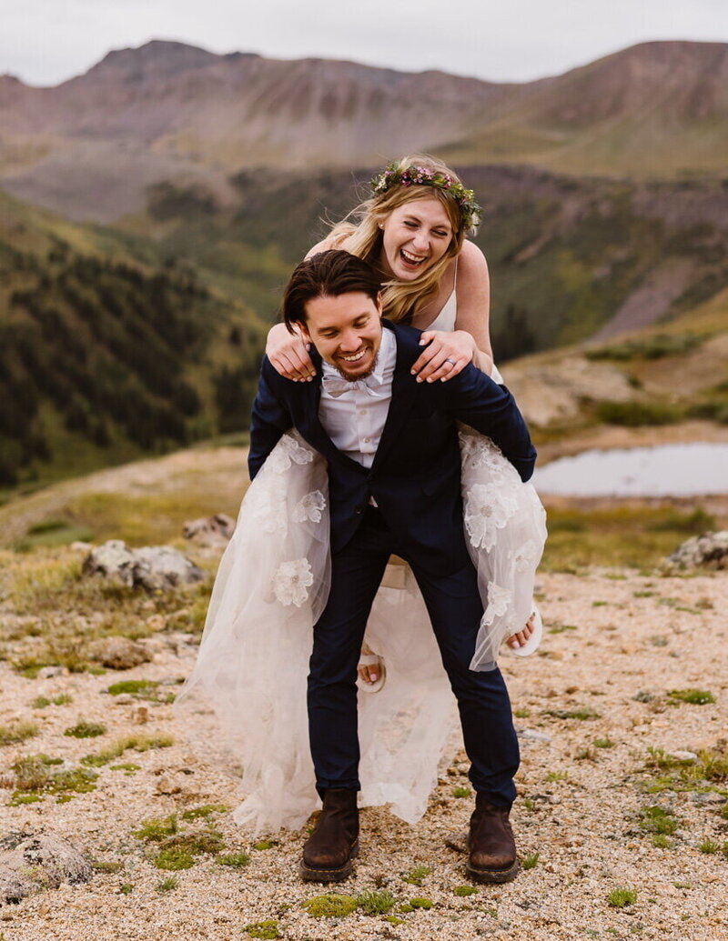 Couple laughs together during their elopement in Aspen, Colorado with Colorado Elopement Photographer Alpine Vows