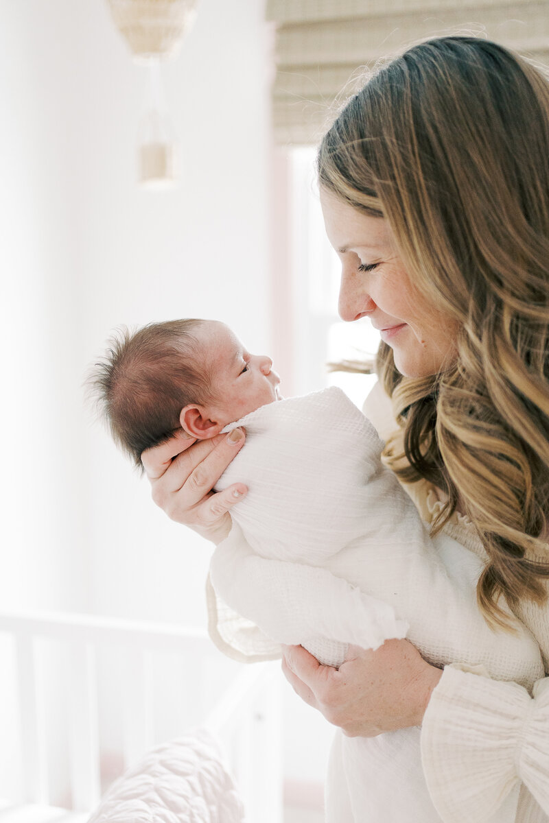 Kaitlin smiling at her newborn