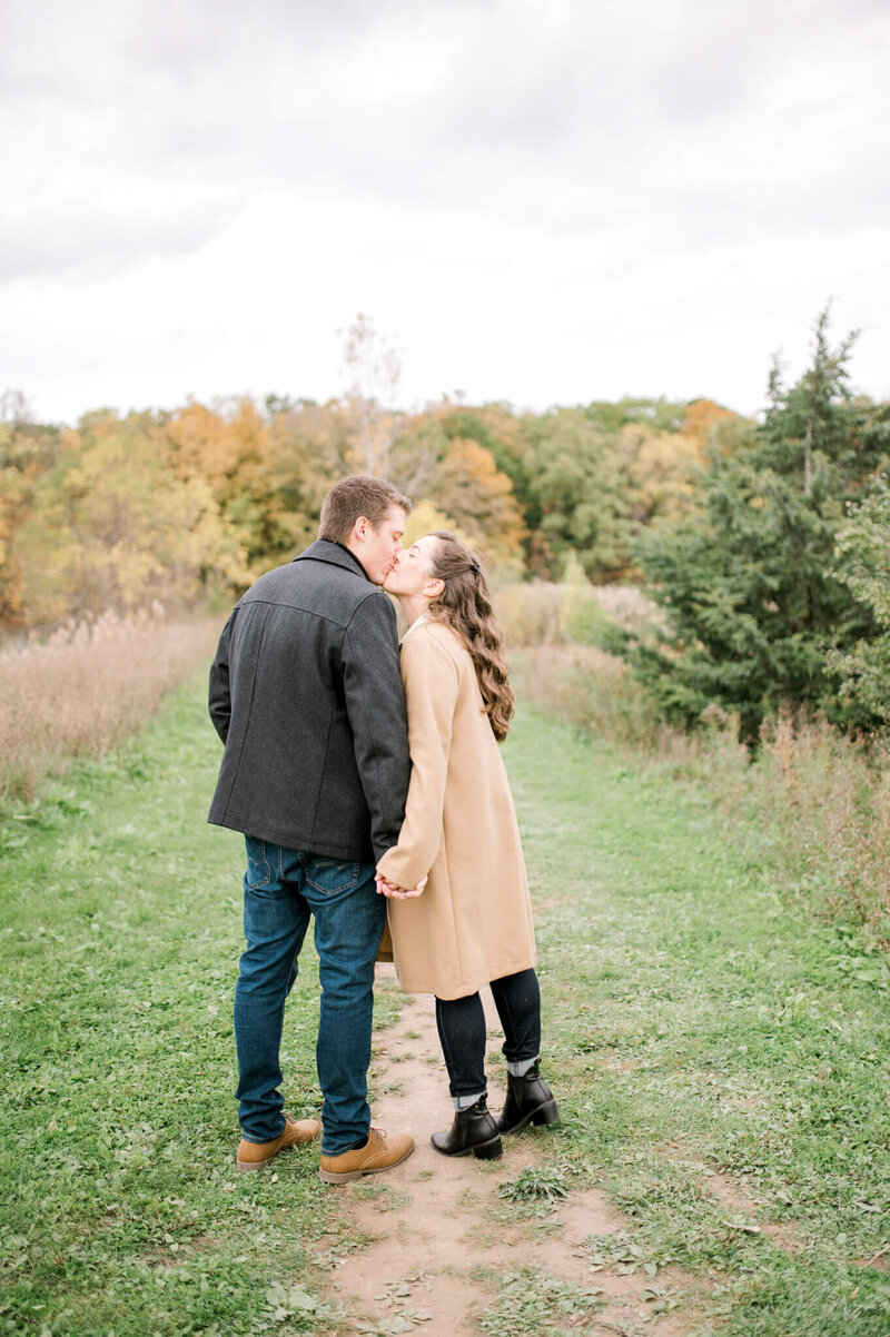 Bride and Groom standing nose to nose captured by Niagara wedding photographer Kristine Marie Photography