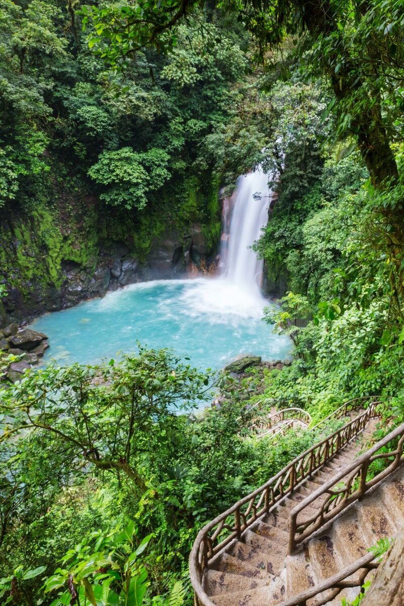 Rio Celeste,  A picturesque river with turquoise waters in Costa Rica, surrounded by lush rainforest and captivating natural beauty.