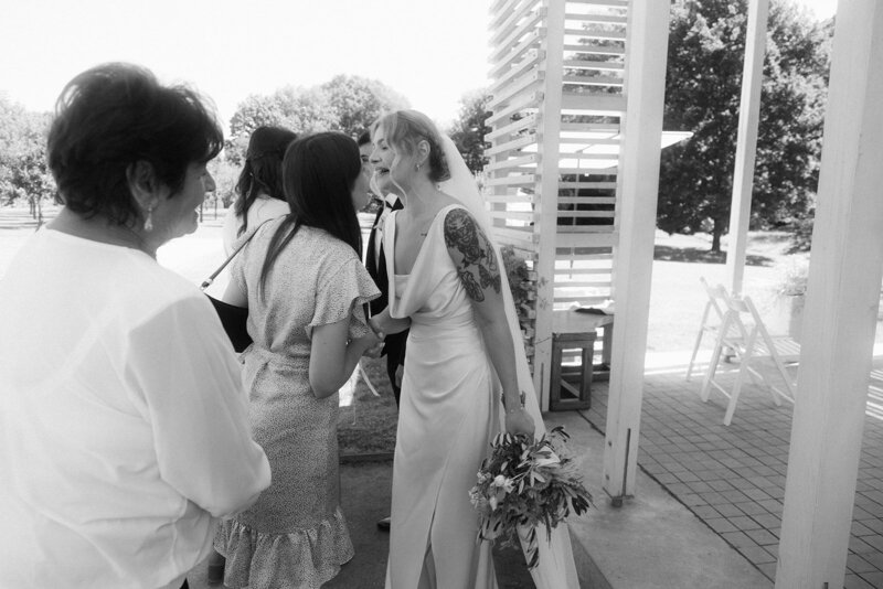 Luxury wedding in Europe – sophisticated bride in a modern wedding gown and groom in a timeless suit.