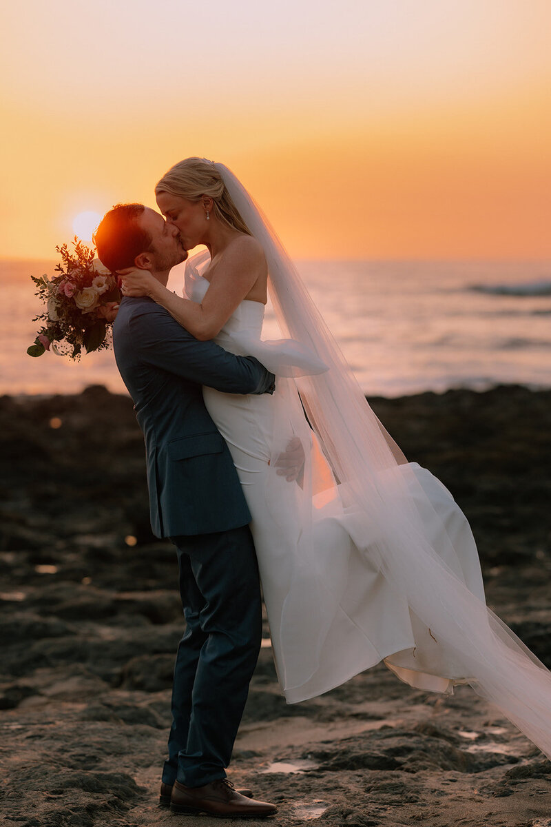 Rich sunset colors after a luxury beach wedding in Tamarindo Costa Rica. 