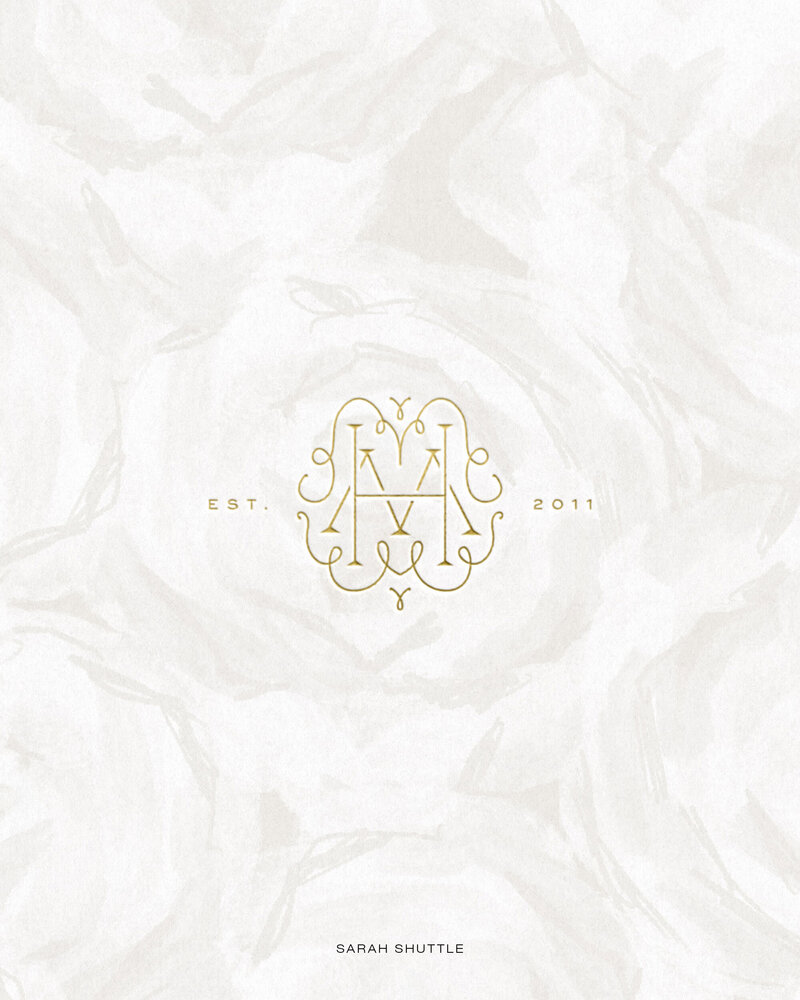 Custom HM monogram design for Hannah McClune over painted background