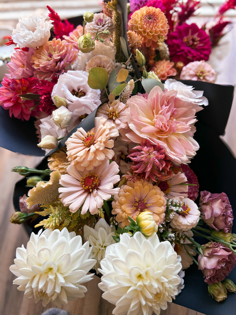 locally grown autumn bouquets with dahlias, zinnias, celosia, eucalyptus
