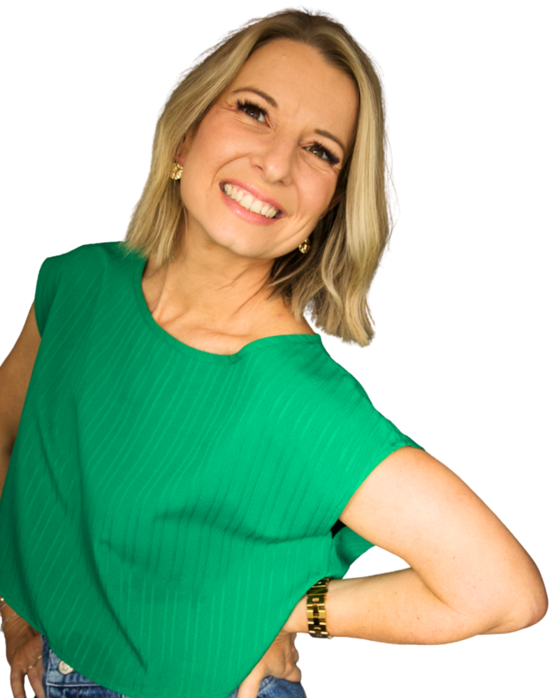 Wendy Griffith smiling confidently in a green top, Christian coach helping women in midlife thrive through faith, purpose, and grace.