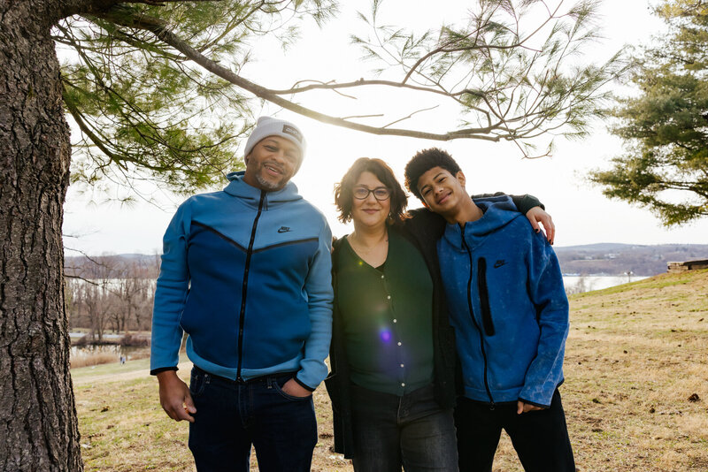 Beautiful Family posing for portraits at Bowdoin Park in Wappingers Falls, New York