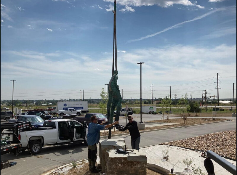 Art installation by crane in Denver Metro and Foothills