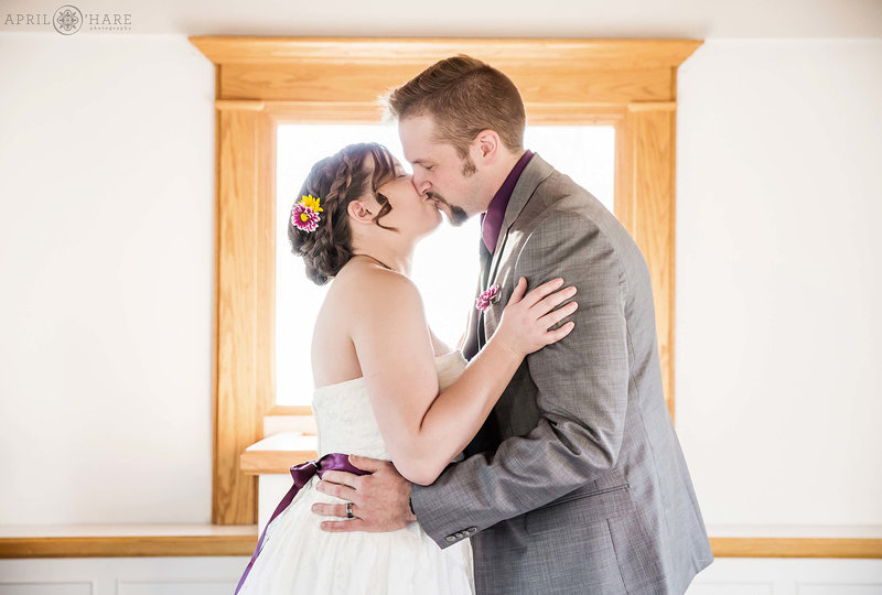 Wedding ceremony kiss at American Mother's Chapel at Rock Ledge Ranch