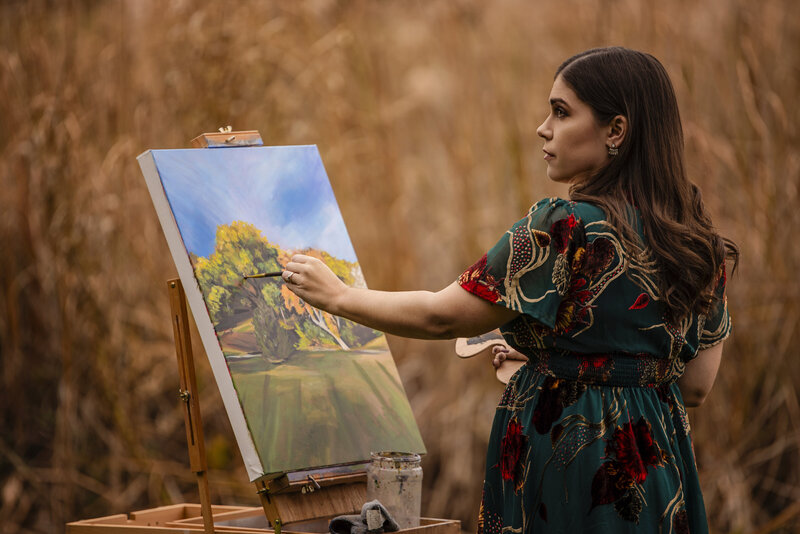 Debbie Boman, live wedding painter, painting a landscape