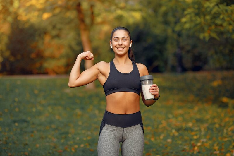 sports-girl-black-top-training-autumn-park