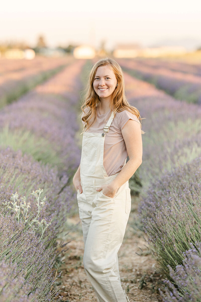 A Bay Area based photographer standing in a lavender field