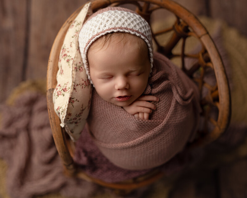 newborn-sleeping-in-basket-rustic-wrap-paris-ontario