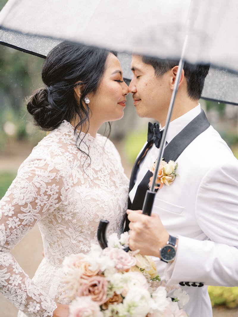 Bride and groom raining portraits