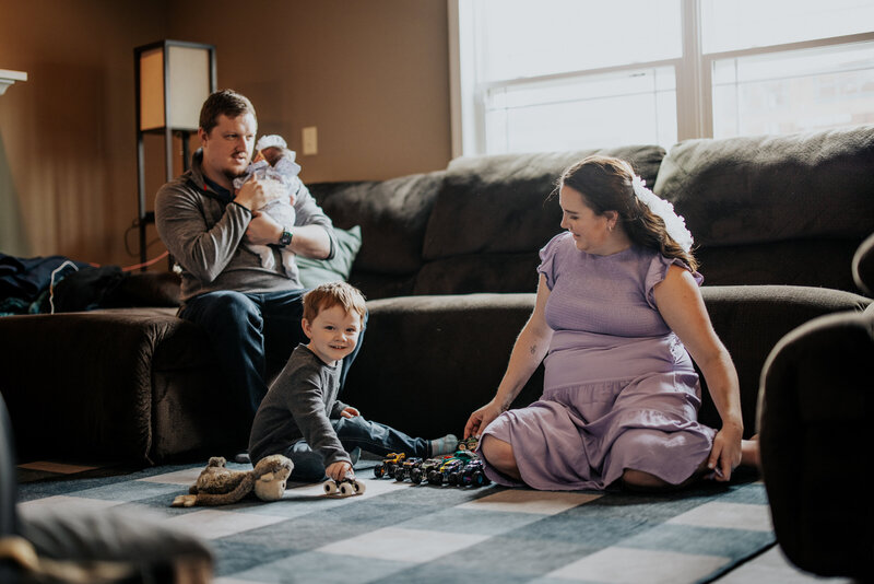 Capture heartwarming family moments with Light By Zoey Photography in Champaign-Urbana, IL. Specializing in lifestyle sessions, we create timeless memories of families in the comfort of their own homes.