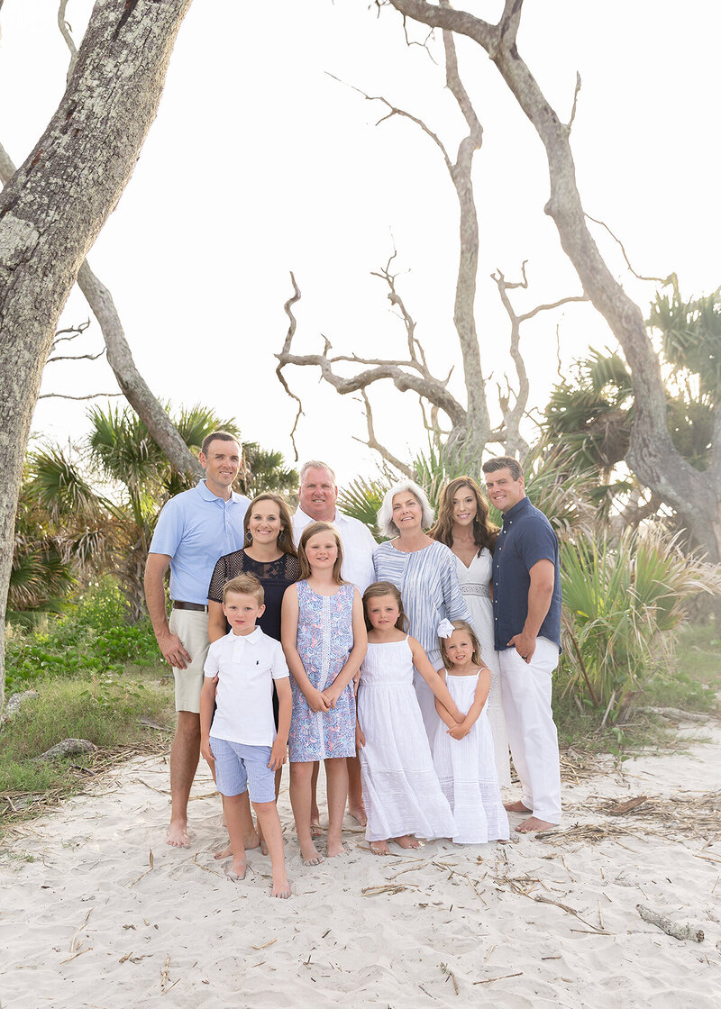 newborn baby boy photographed at home on a simple white backdrop