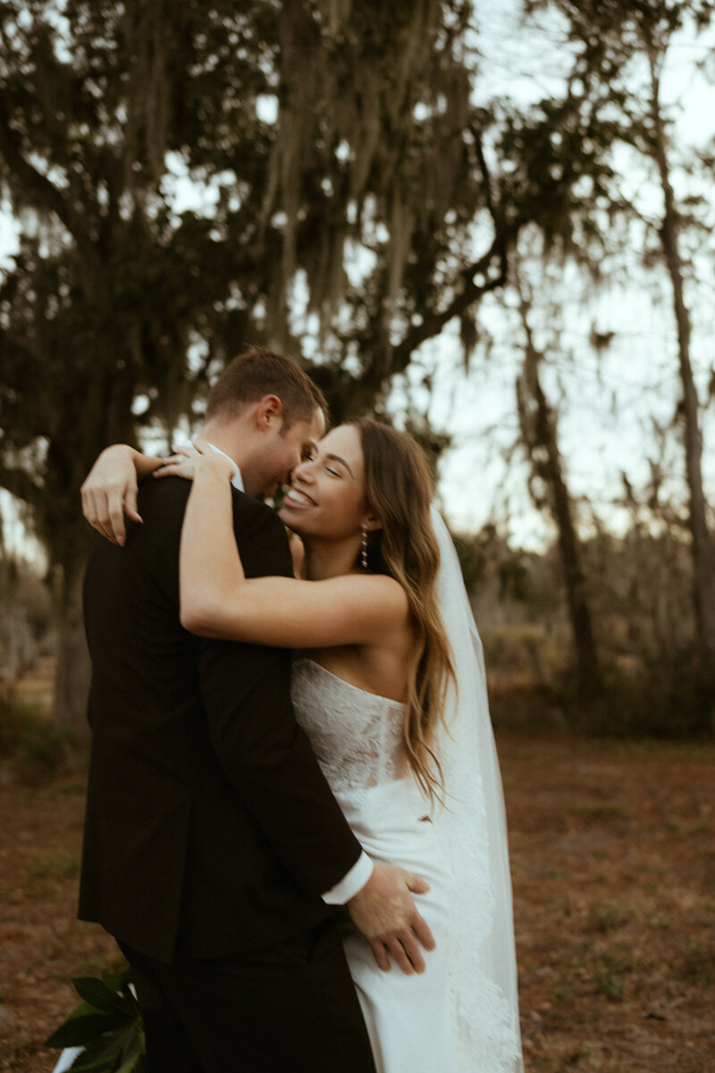bride and groom laughing
