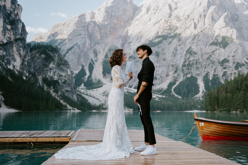 Couple eloping at Lago di Braies in the Dolomites in Italy