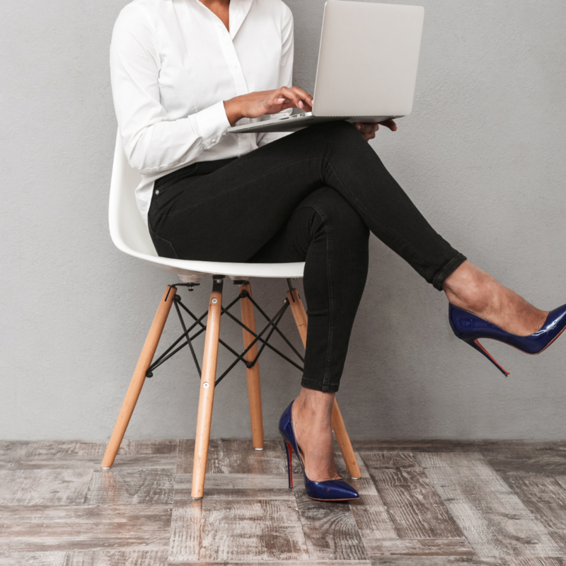 Professional photo of Ohio business woman sitting in chair