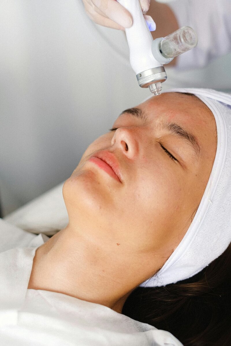 Woman receiving a facial