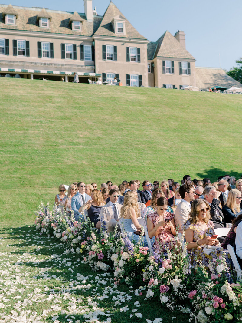 Outdoor wedding ceremony, photo of the crown, the aisle is covered in petals