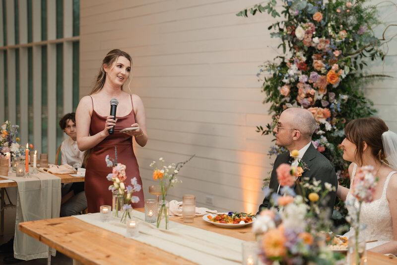 this maid of honor shares her wedding speech while wearing a beautiful fall bridesmaid dress